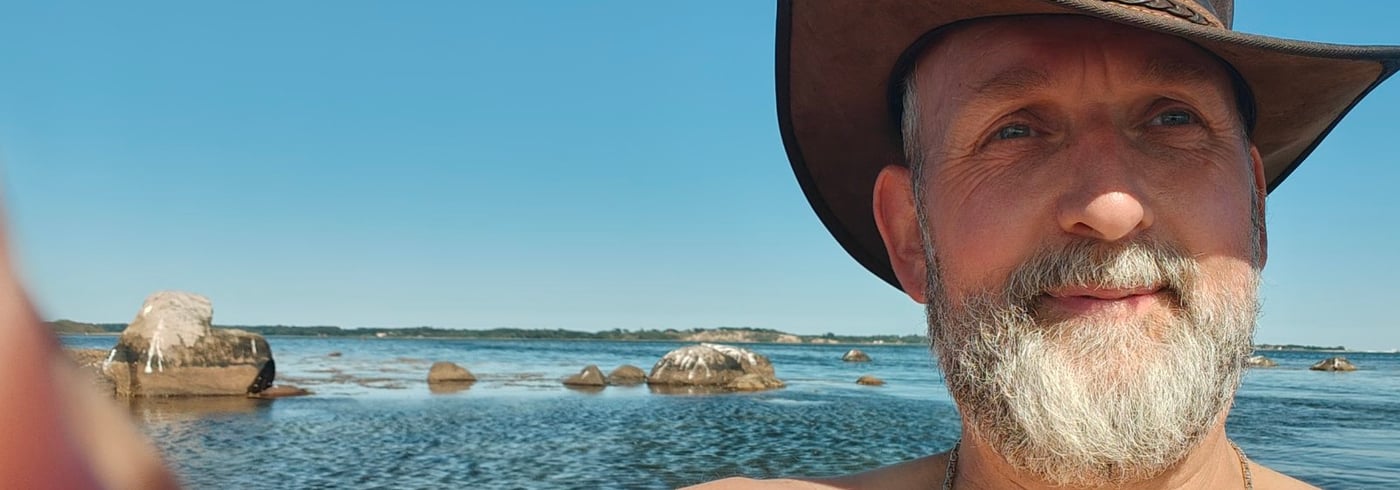 Ralf outdoors by the sea